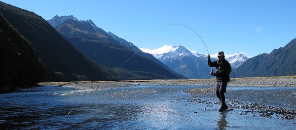 Fly fishing in a remote glacial valley